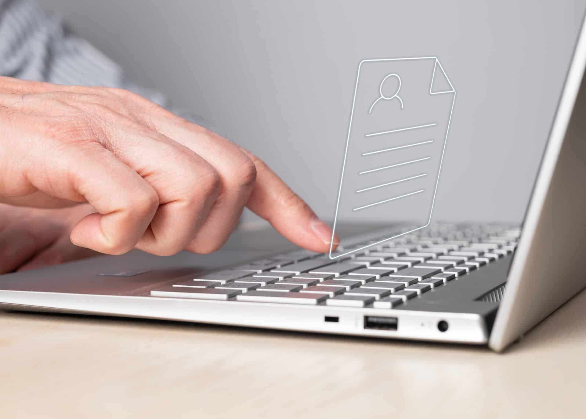 CV, application submission. Man working on laptop and sending curriculum vitae. Male forefinger pressing enter button. Resume uploading concept.